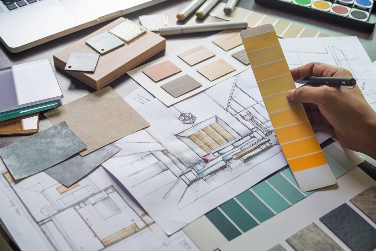 Table arranged with interior design drawings and color swatches near Wayne, Fairfield, and Paramus, New Jersey (NJ)