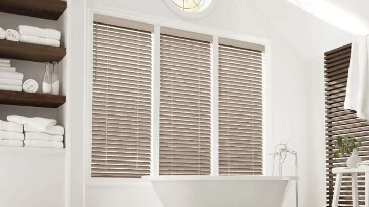 Hunter Douglas EverWood® Faux Wood Blinds for bathroom windows in a modern, clean restroom at White House Designs For Life near Paramus, Chester, Wayne, and Fairfield, New Jersey (NJ)