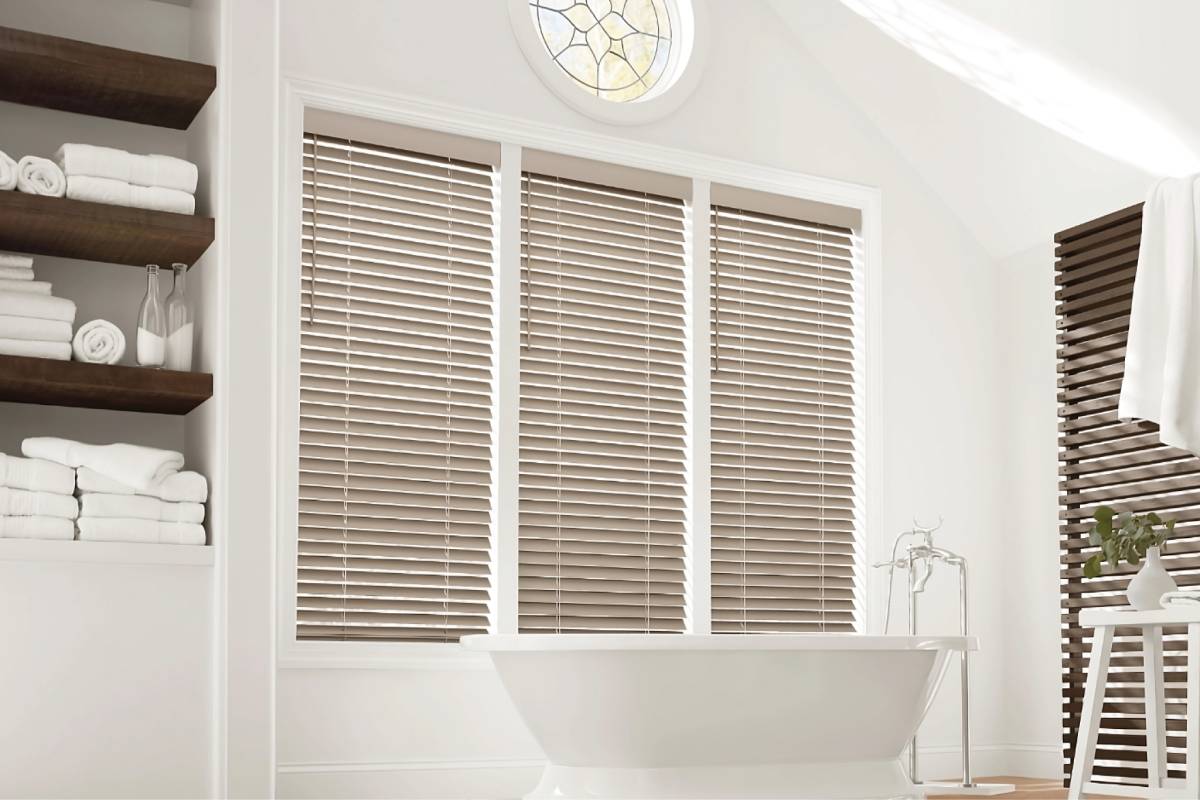 Hunter Douglas EverWood® Faux Wood Blinds for bathroom windows in a modern, clean restroom at White House Designs For Life near Paramus, Chester, Wayne, and Fairfield, New Jersey (NJ)
