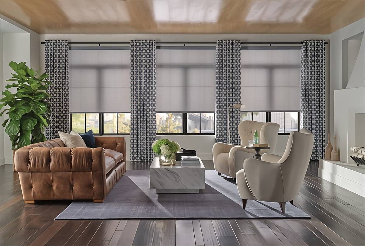 Hunter Douglas roller window shades paired with patterned drapes in a formal living room White House Designs for Life near Paramus, NJ