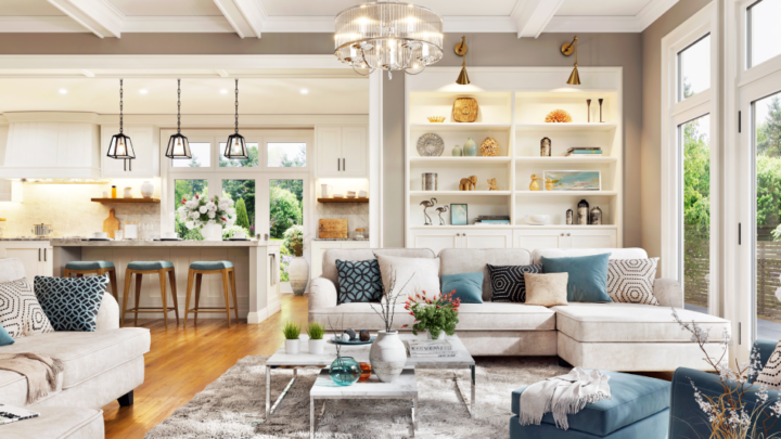 A luxurious and elegant interior design living room in an open-concept layout with a white kitchen
